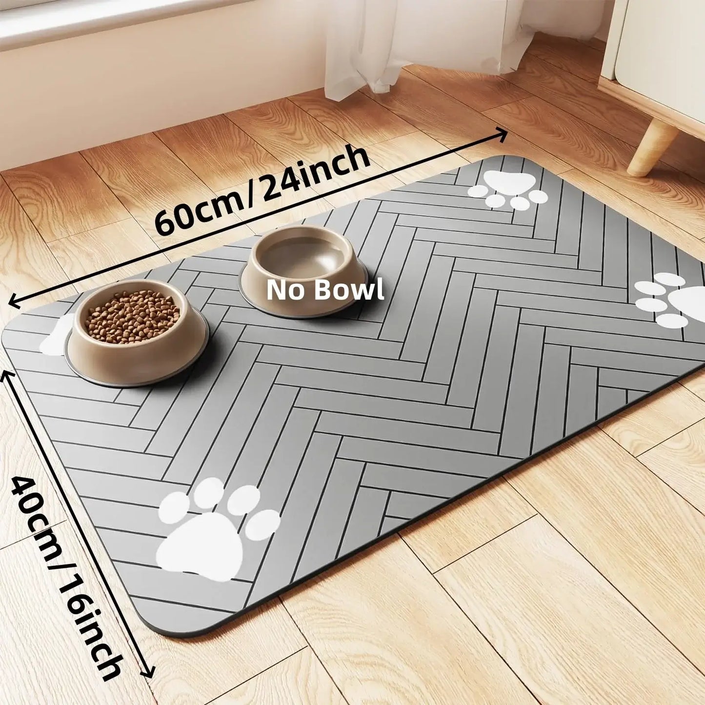 Absorbent pet feeding mat on wooden floor with measurements, bowls, and paw prints for dry and clean feeding areas.
