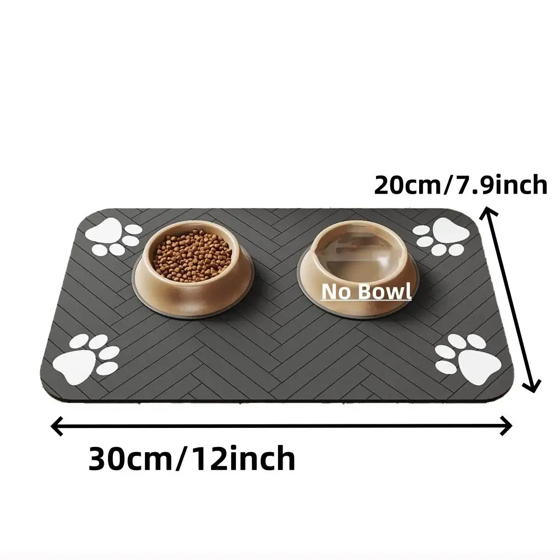 Absorbent Pet Feeding Mat with two bowls, paw print design, dimensions: 30cm x 20cm, waterproof backing for easy cleaning.